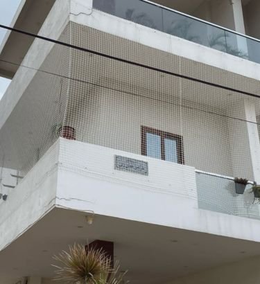 Building Covering Bird Nets in Hyderabad installed by Lasya Safety Nets to prevent birds from entering buildings and nesting in open structures.