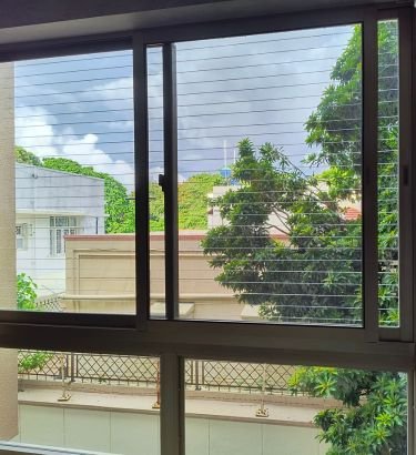 Invisible Grills Fixing for Windows in Hyderabad by Lasya Invisible Grills providing safety, security and unobstructed views for homes and apartments.